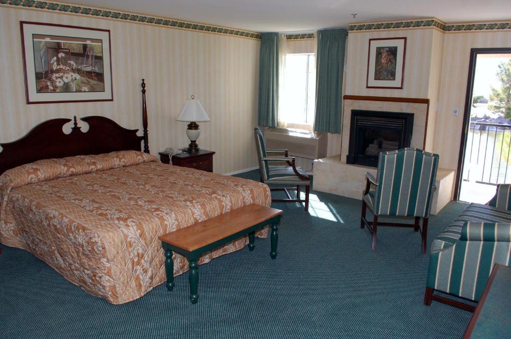 Kamer met 2 Queensize Bedden en Uitzicht op het Meer